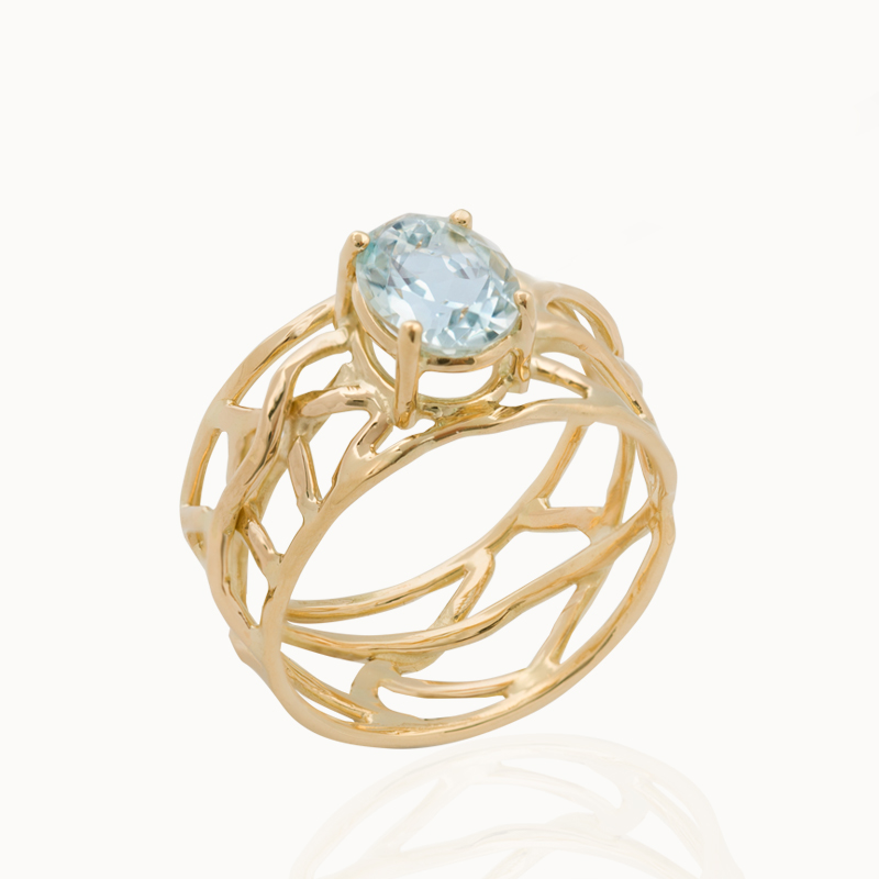 Ring crafted from 18-karat gold set with an oval cut Aquamarine gemstone made in Antwerp, Belgium by goldsmith and jewellery designer Pascale Masselis